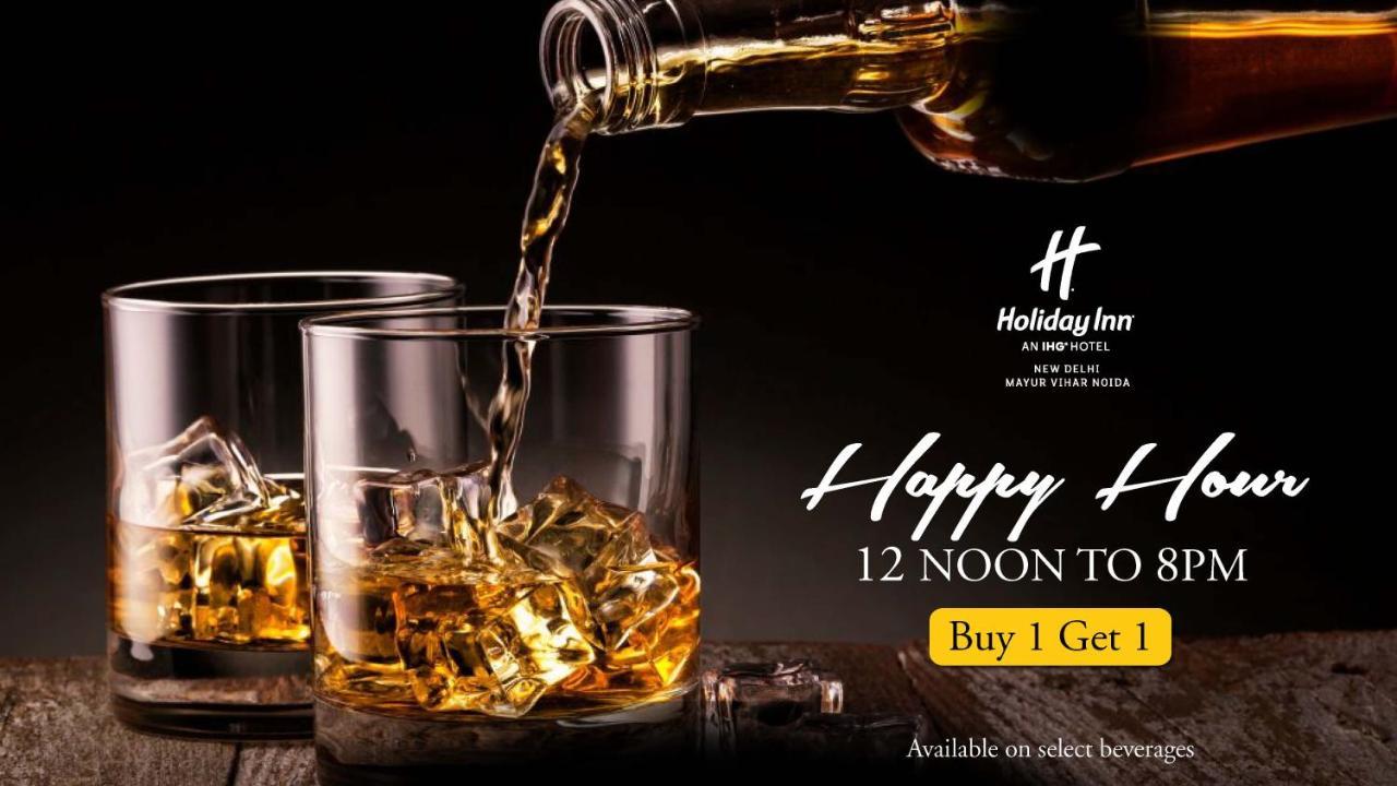Holiday Inn New Delhi Mayur Vihar Noida By Ihg Exterior photo A poster advertising a happy hour